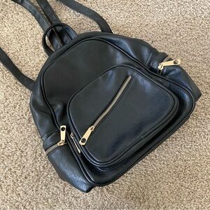 Midsize purse backpack